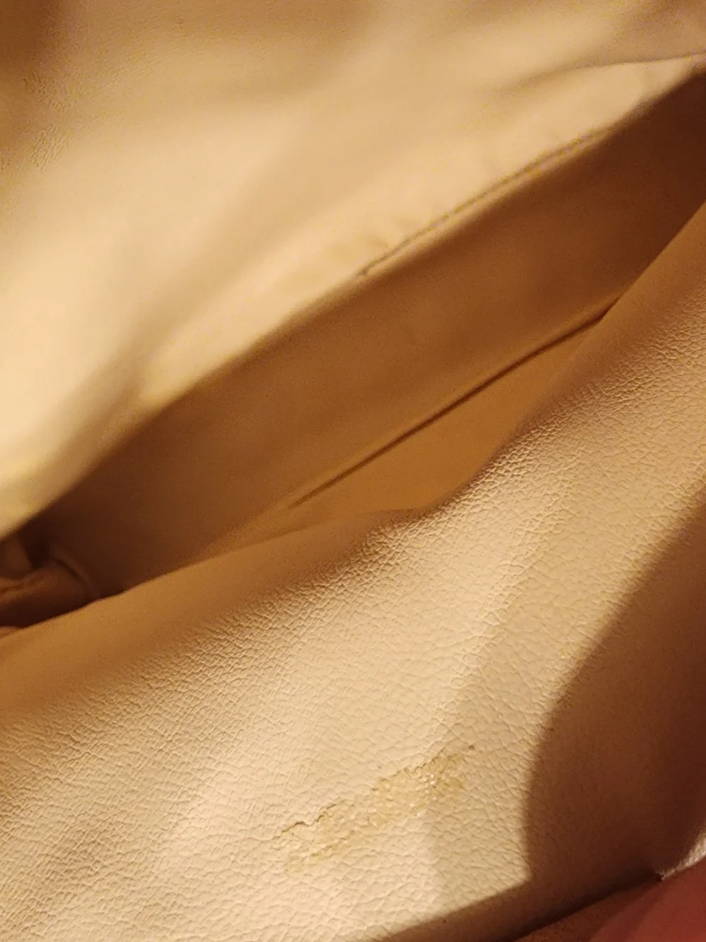 CELINE pouch is crafted from brown Triomphe canvas and features tan leather trim